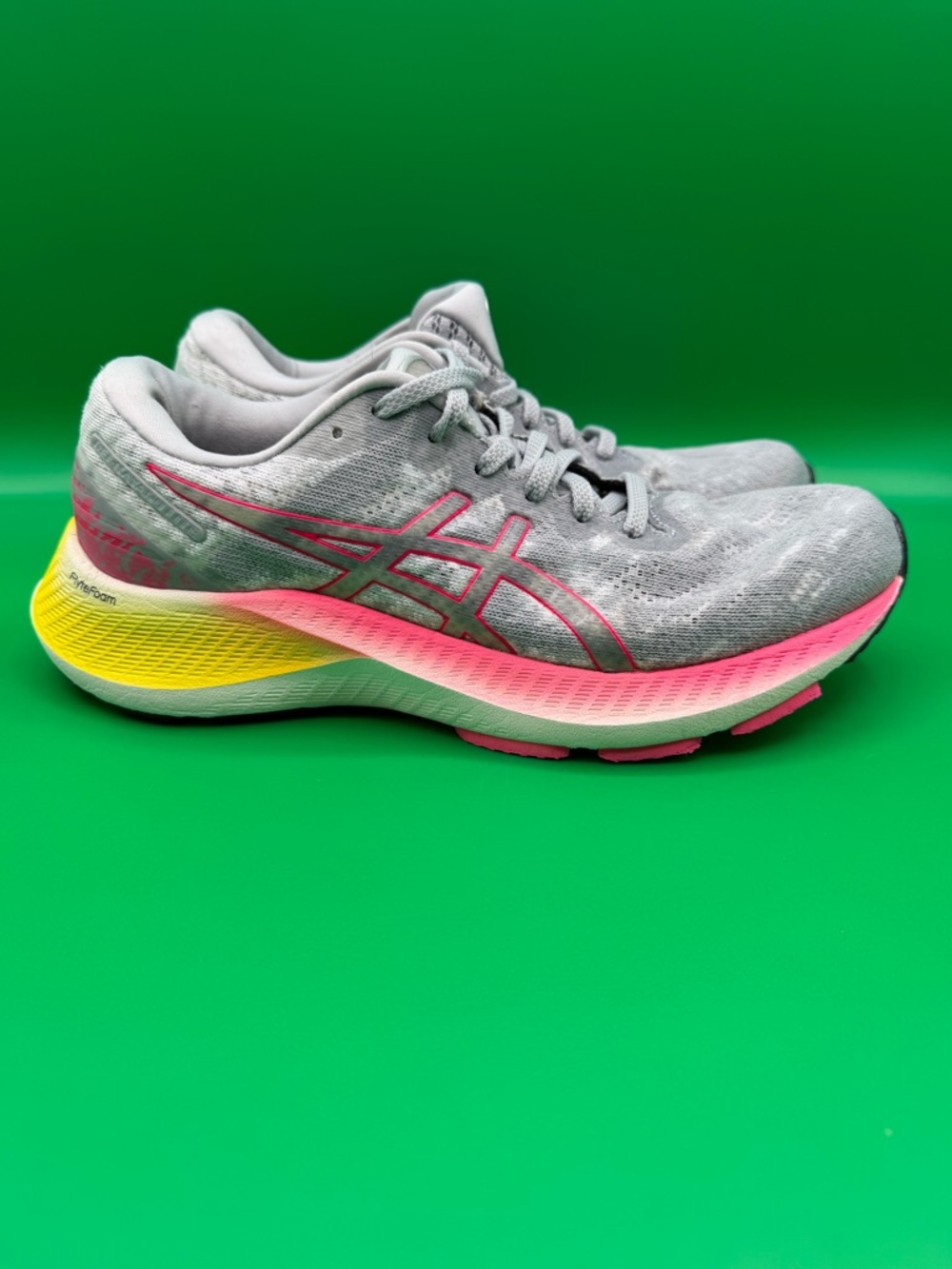 ASICS Women's Gray Running Shoes with Pink and Yellow Accents